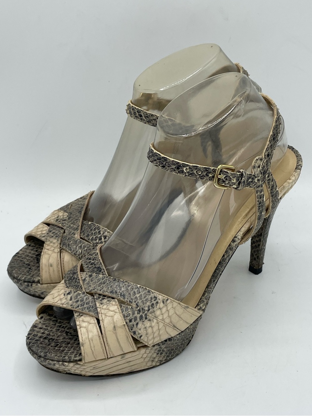 Stuart Weitzman “Loop Thru” Snakeskin Leather Platform Heel.
